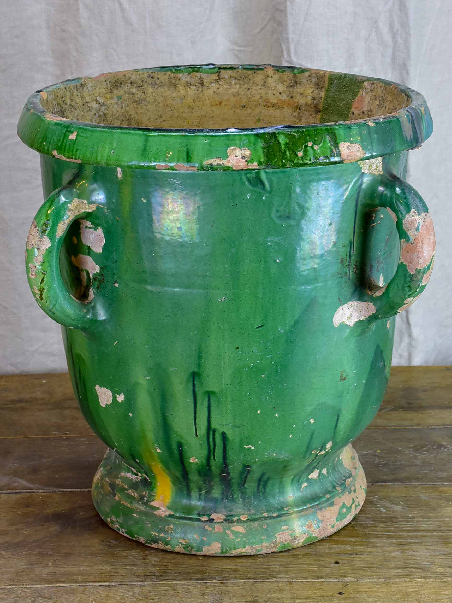 Very large antique French garden planter with green glaze and 4 handles