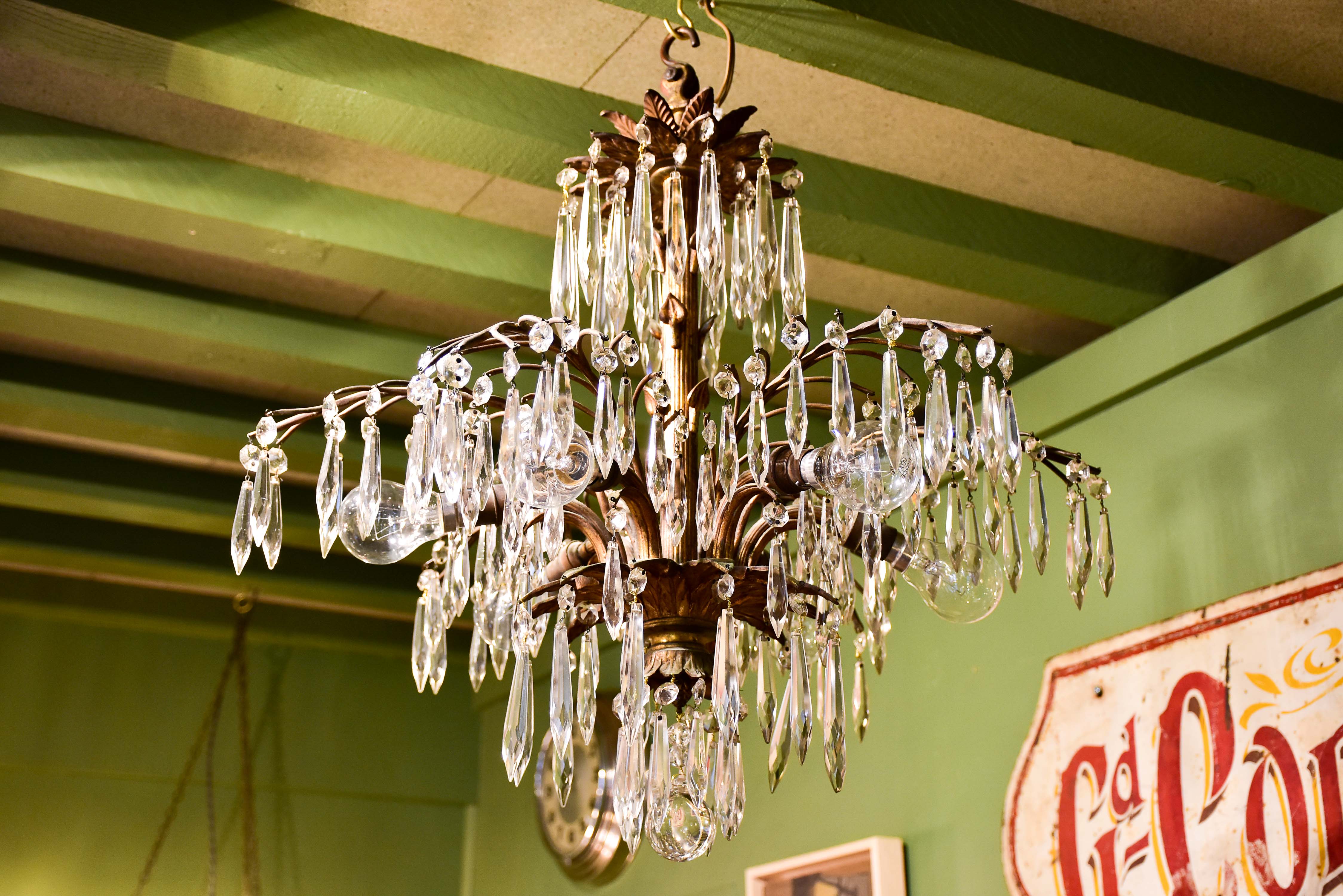 Gold palm frond chandelier with crystals