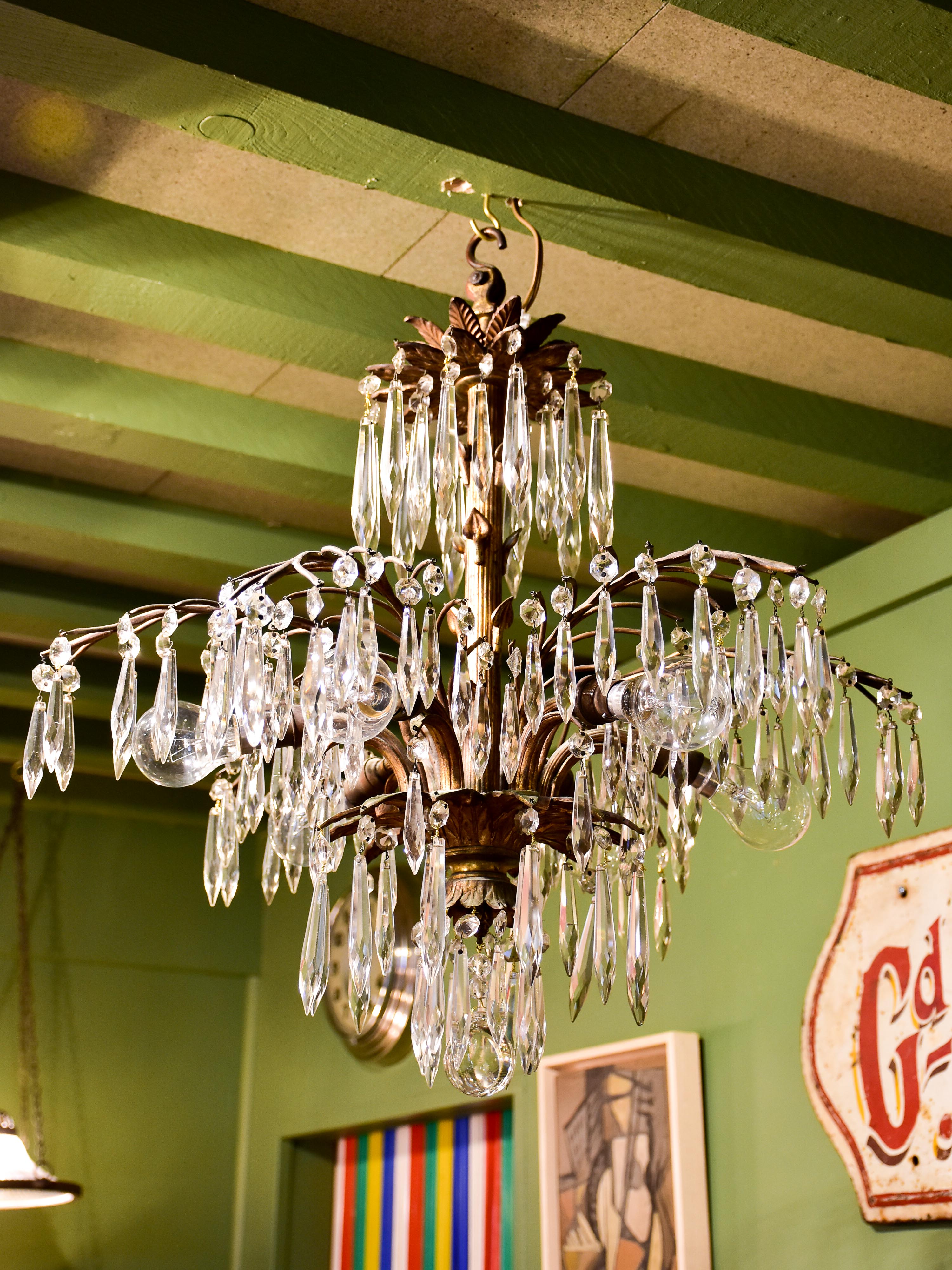 Gold palm frond chandelier with crystals