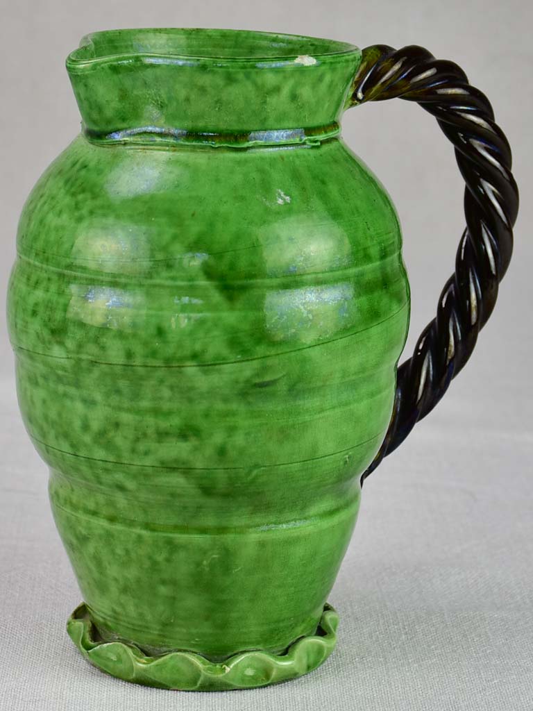 RESERVED Mid century pitcher from Vallauris with green glaze and twisted handle 8¾"