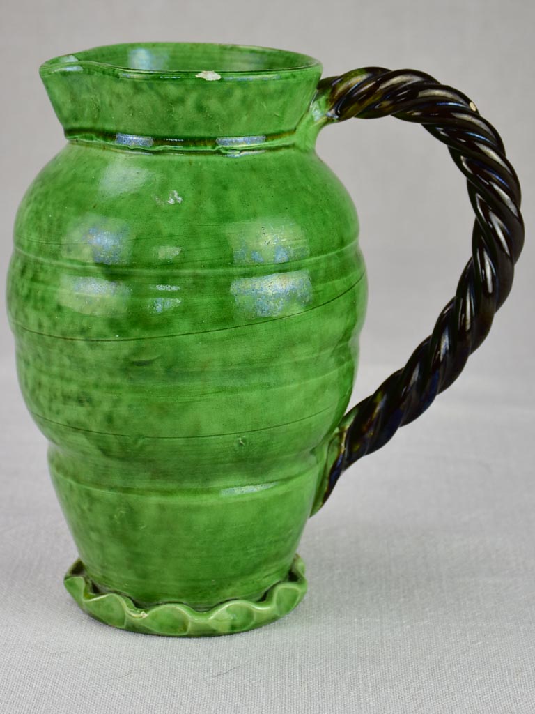 RESERVED Mid century pitcher from Vallauris with green glaze and twisted handle 8¾"