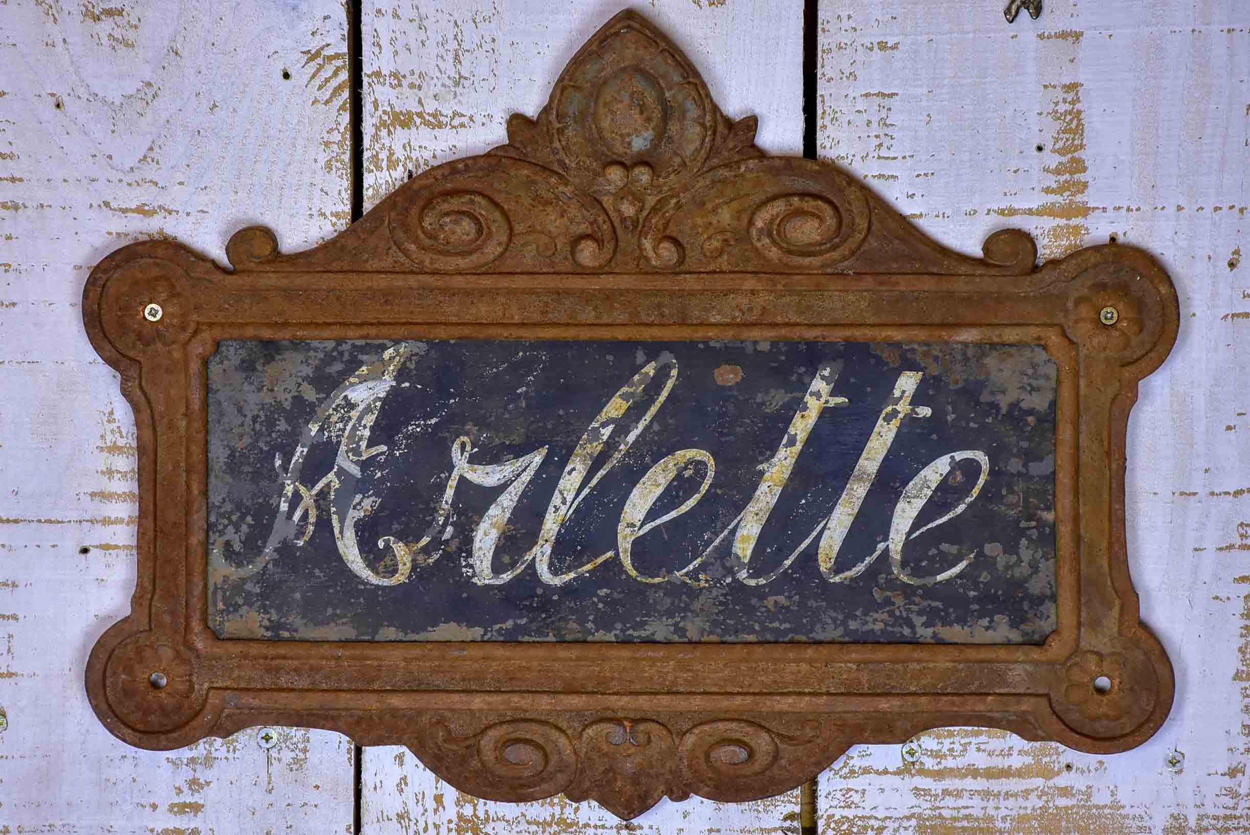 Two antique French cast iron signs from horse stables