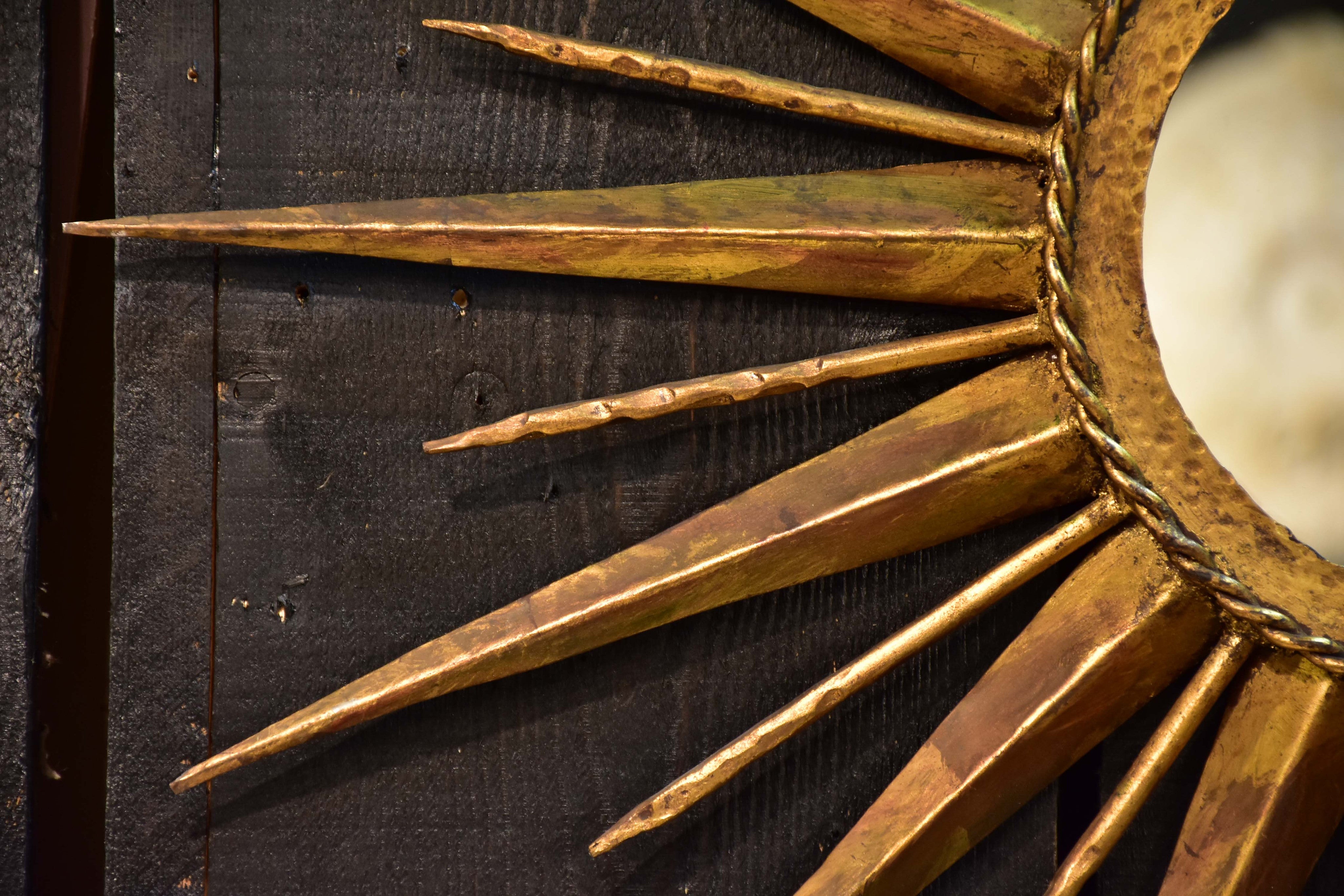 Vintage sunburst mirror with gilded metal frame