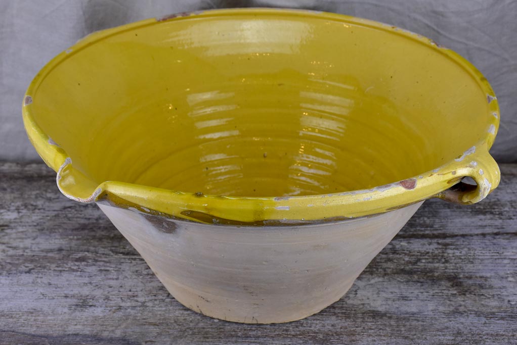 Large antique French 'tian' bowl with yellow glaze