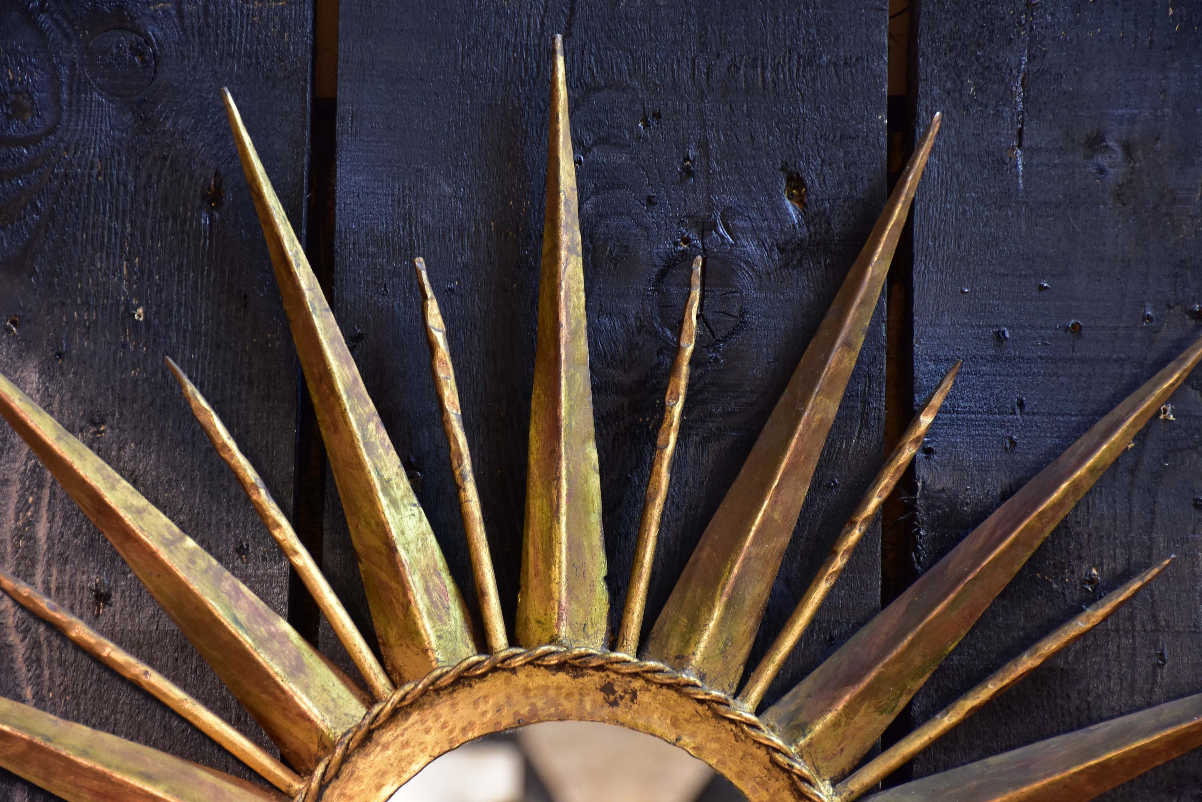 Vintage sunburst mirror with gilded metal frame