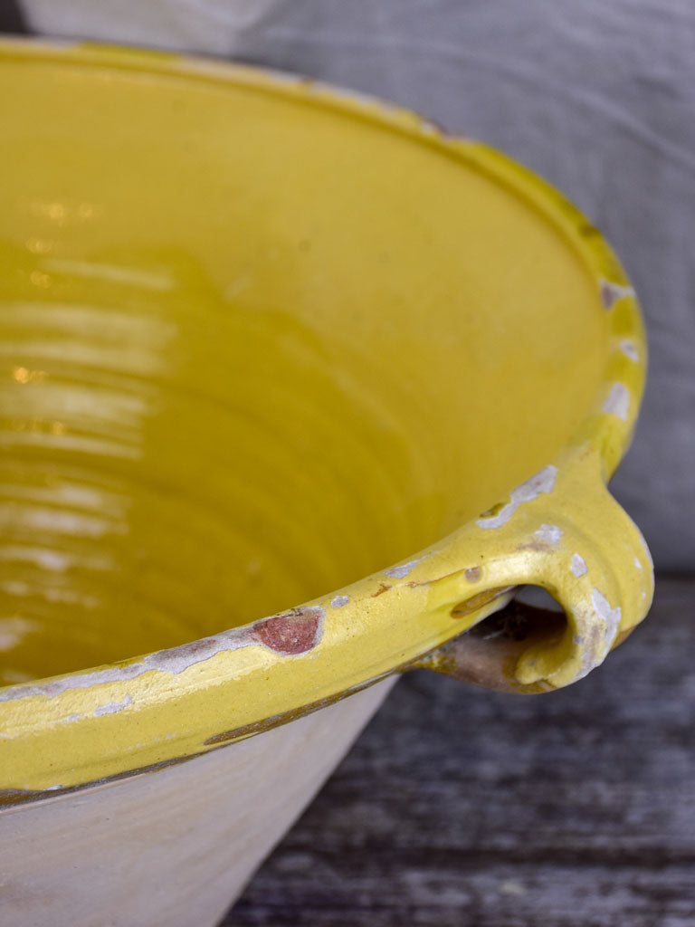 Large antique French 'tian' bowl with yellow glaze