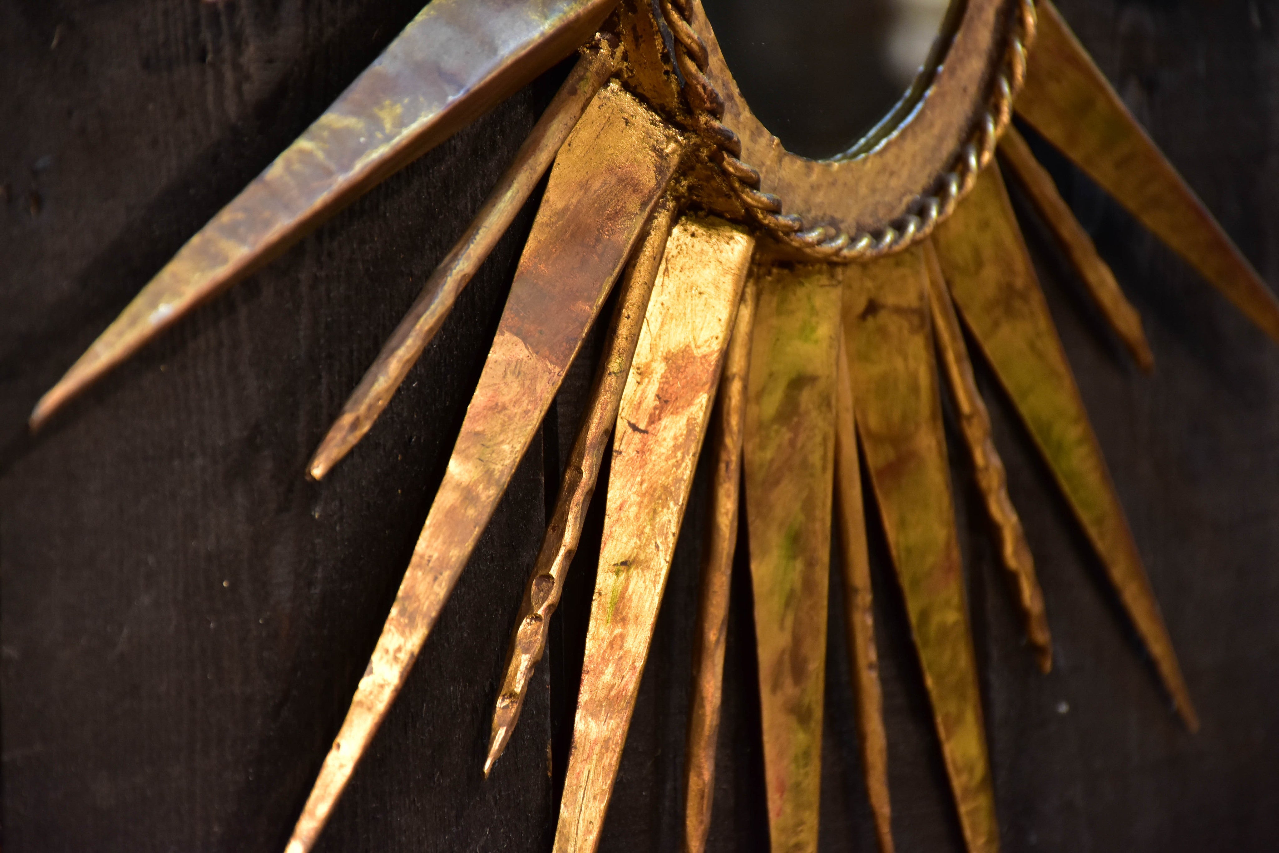 Vintage sunburst mirror with gilded metal frame