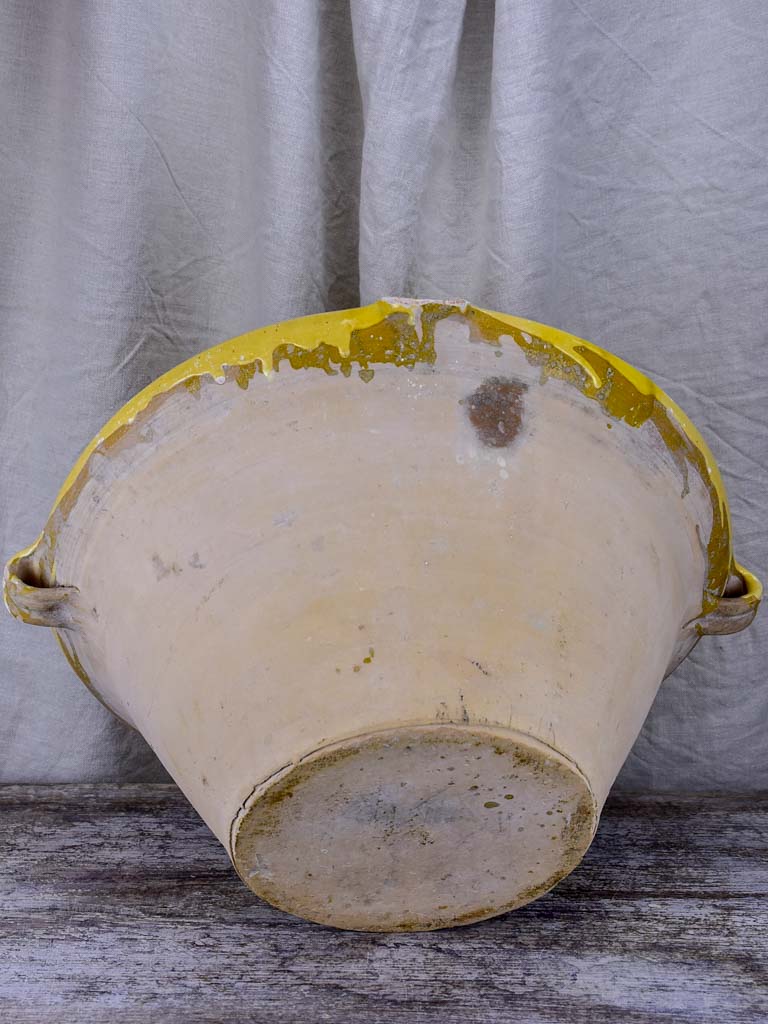 Large antique French 'tian' bowl with yellow glaze