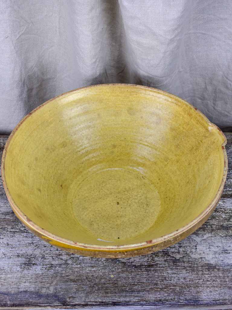 Antique French preserving bowl with yellow glaze