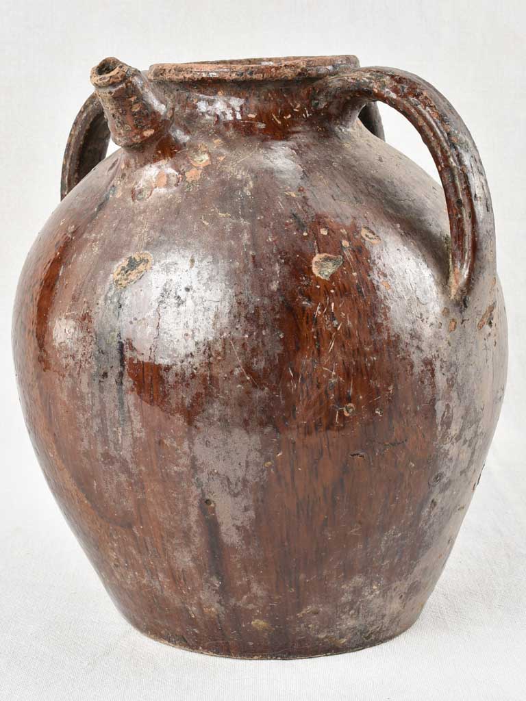 Walnut oil pitcher with brown glaze 12½"