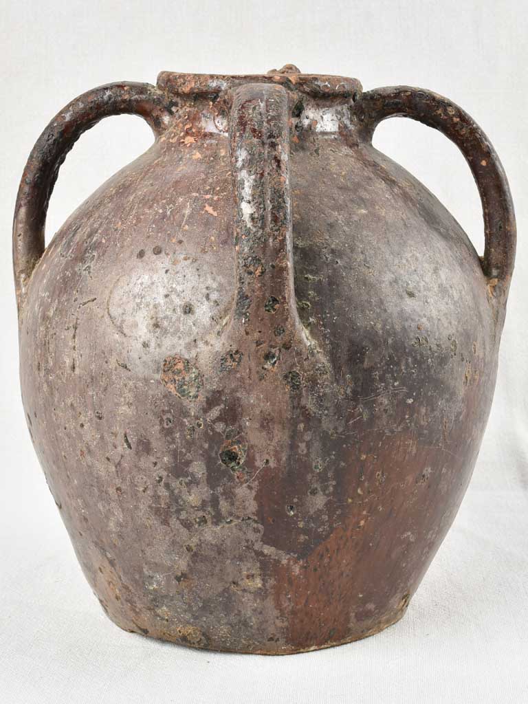 Walnut oil pitcher with brown glaze 12½"