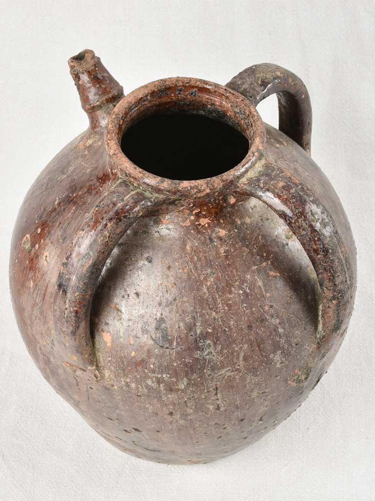 Walnut oil pitcher with brown glaze 12½"