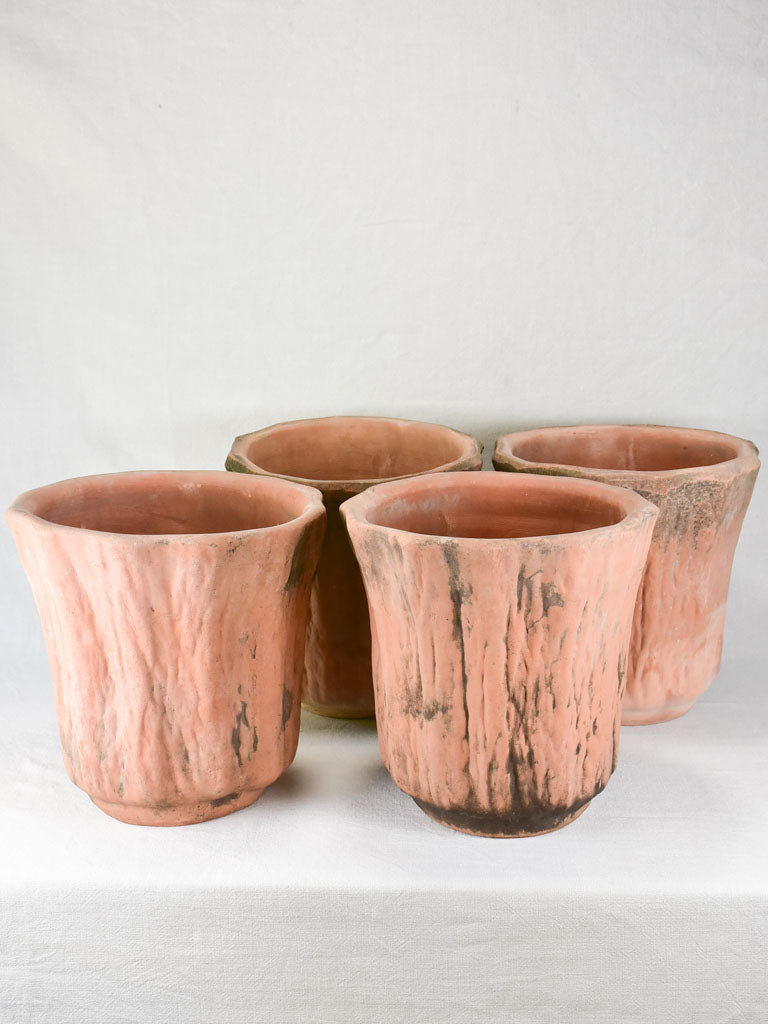 Set of four vintage terracotta garden planters