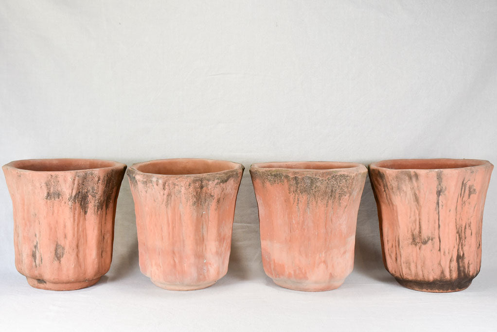 Set of four vintage terracotta garden planters