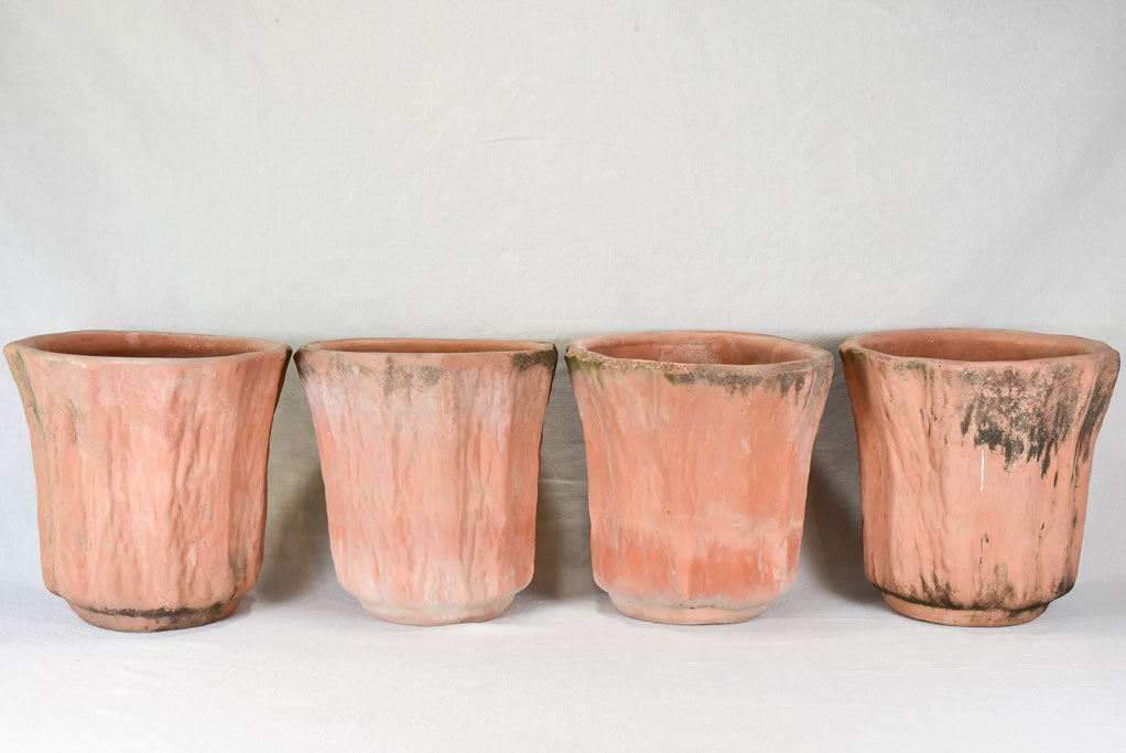 Set of four vintage terracotta garden planters