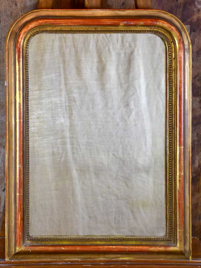 Antique French Louis Philippe mirror with timeworn gilt frame 22" x 29 ½"