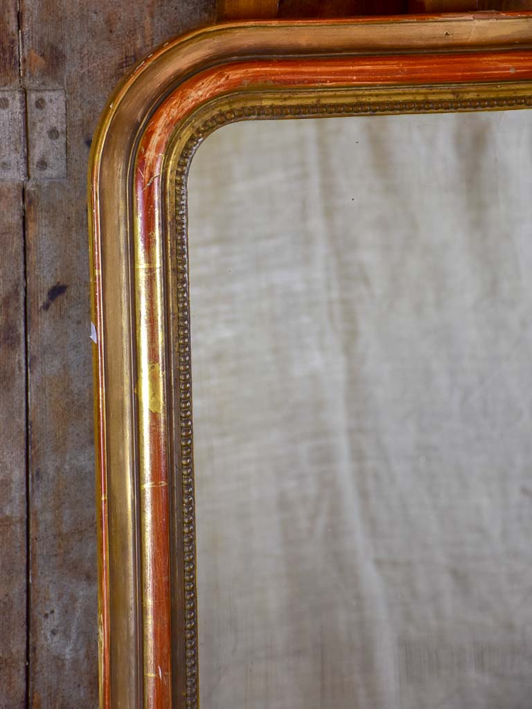 Antique French Louis Philippe mirror with timeworn gilt frame 22" x 29 ½"