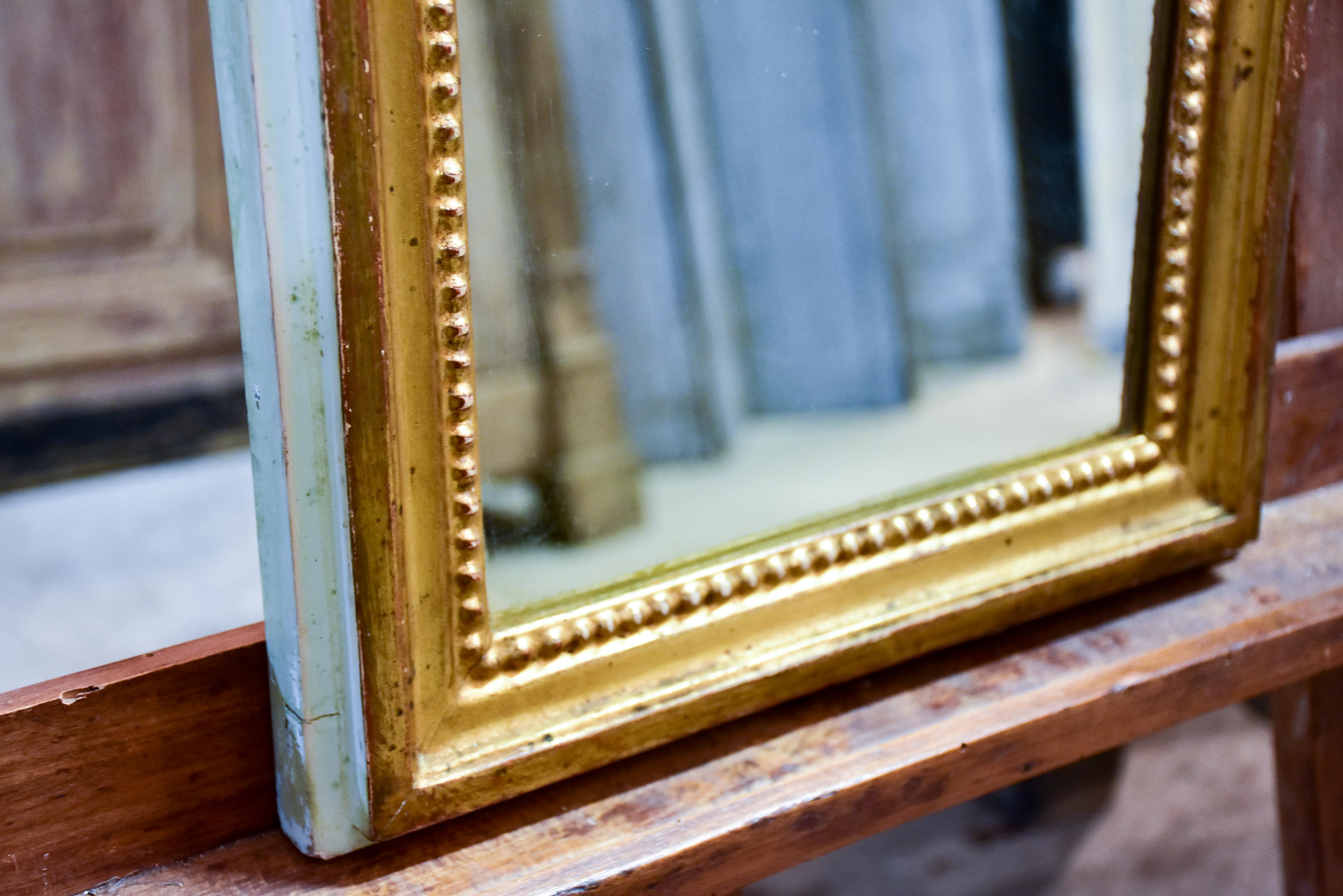 Narrow rectangular Louis Philippe mirror with gilded and sage green frame