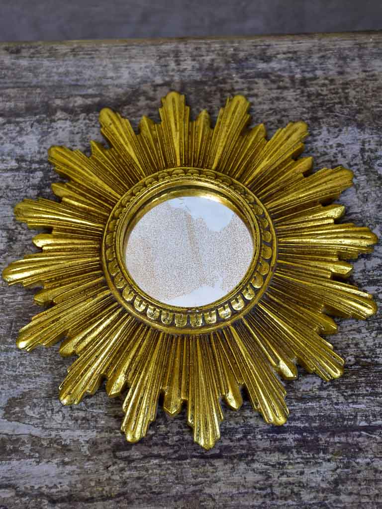 Small vintage gold sunburst mirror 8 ¾"