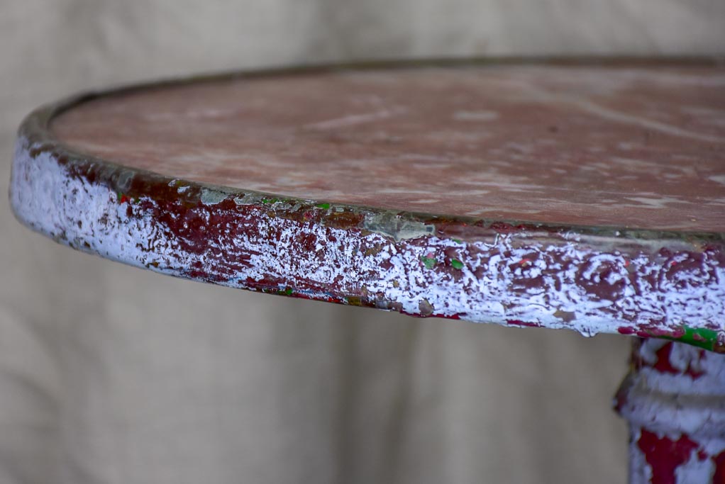 French bistro table with red marble top