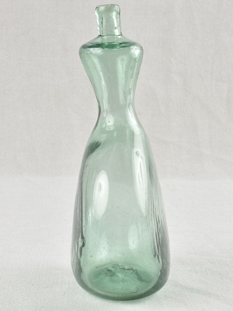 Small antique blown-glass lamb's milk bottle 8¼"