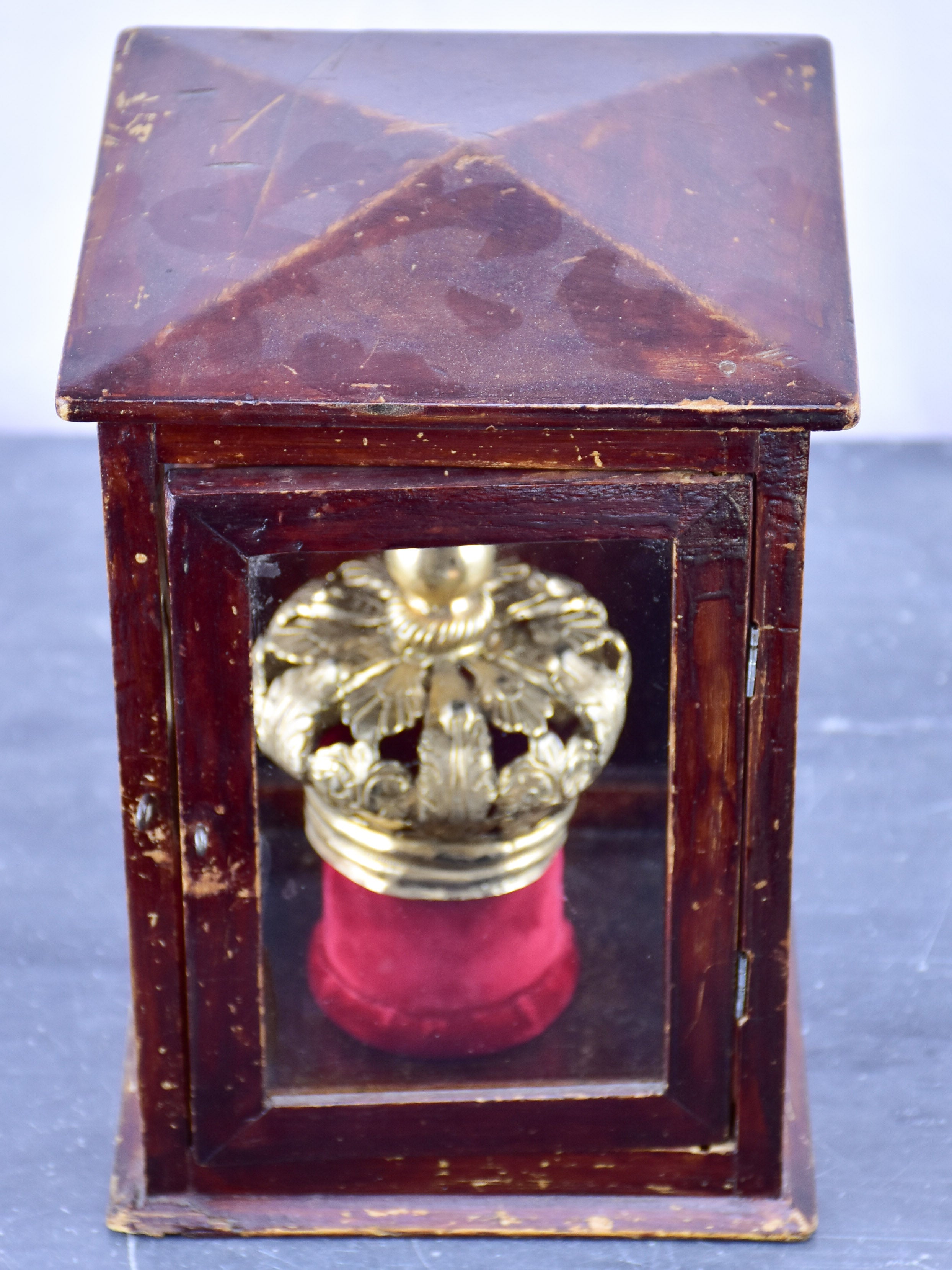 Vintage religious crown in a window box