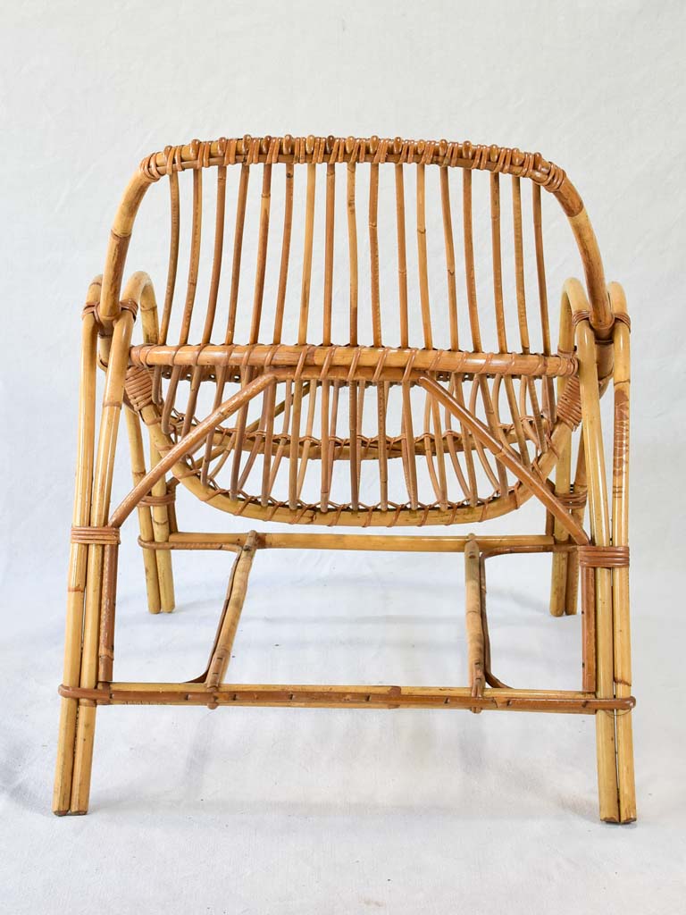 Pair of low rattan armchairs and table