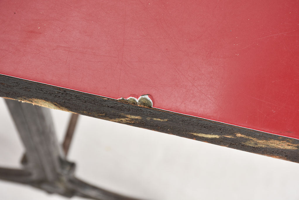 Red Formica bistro table with cast iron base (8 available)