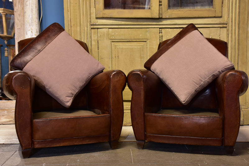 Pair of vintage French brown leather club chairs