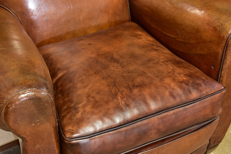 Pair of vintage French brown leather club chairs