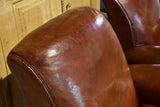 Pair of vintage French brown leather club chairs