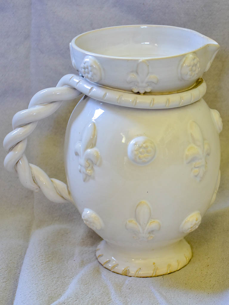 1960's Émile Tessier white ceramic pitcher with fleur de lys