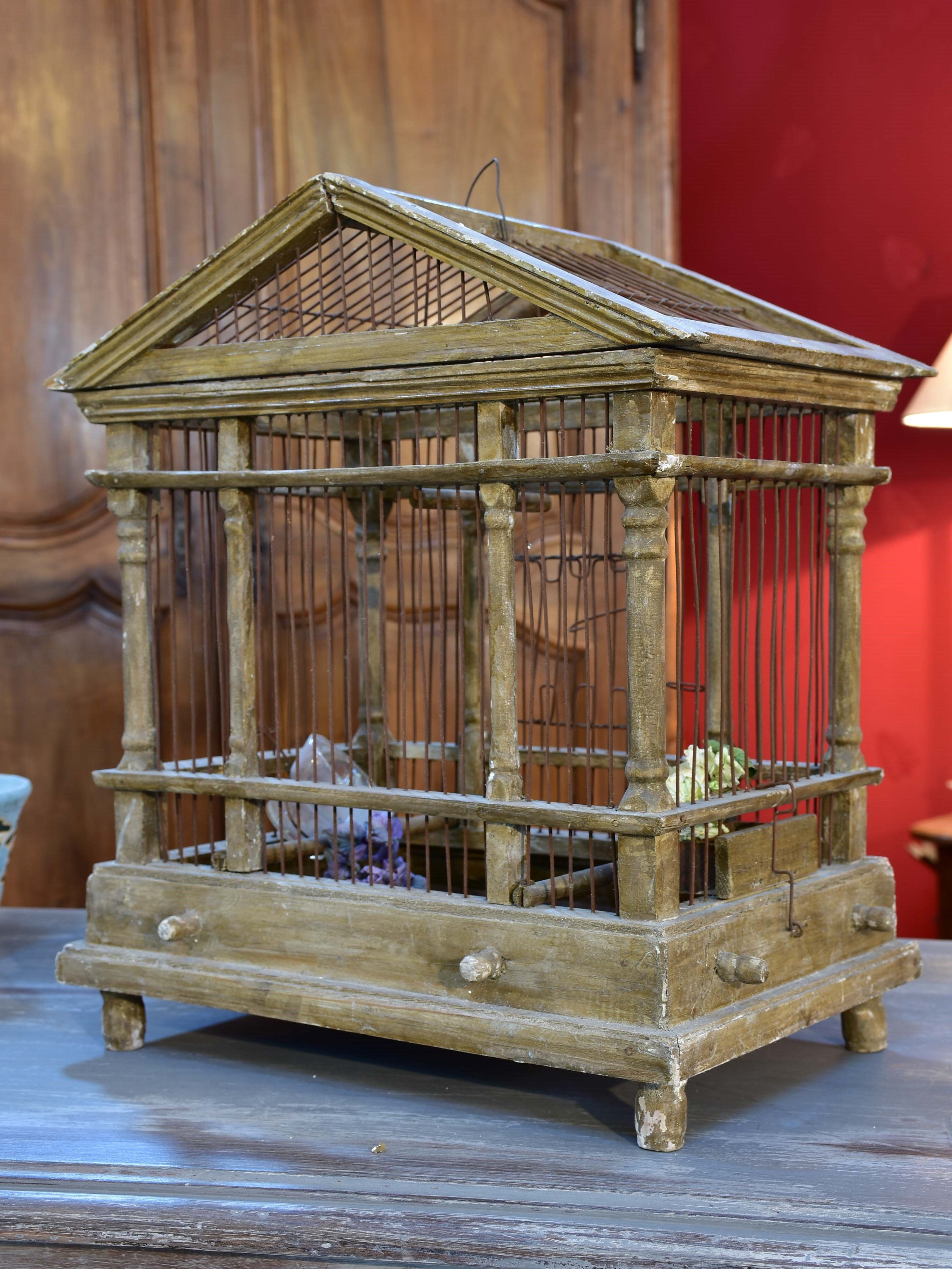 Antique French birdcage with pitched roof