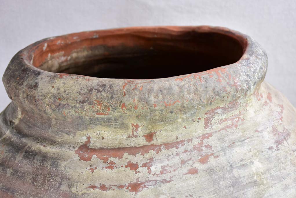 Antique clay pot with ribbed sides and drainage hole 26½"