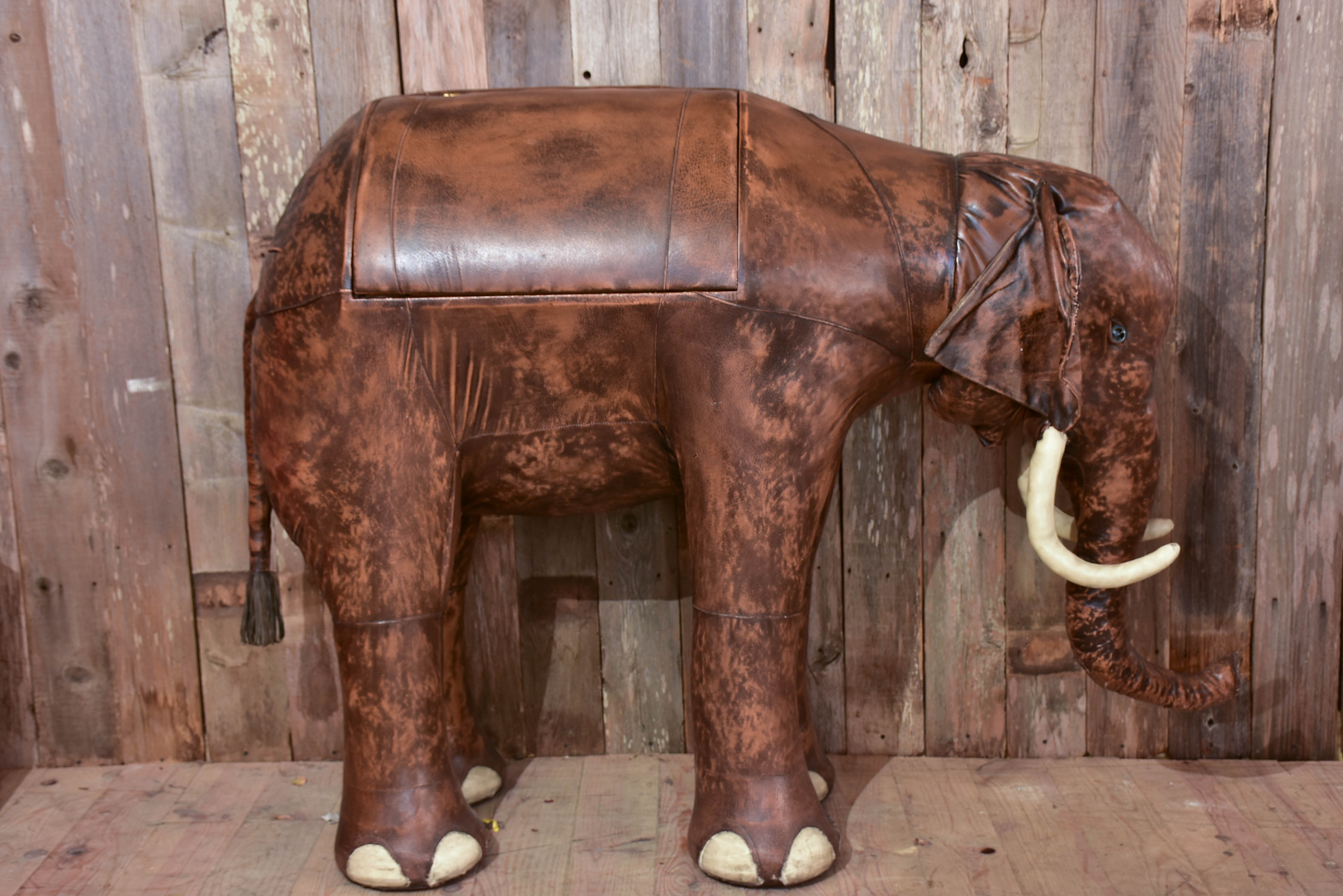 Vintage elephant in leather with hidden bar