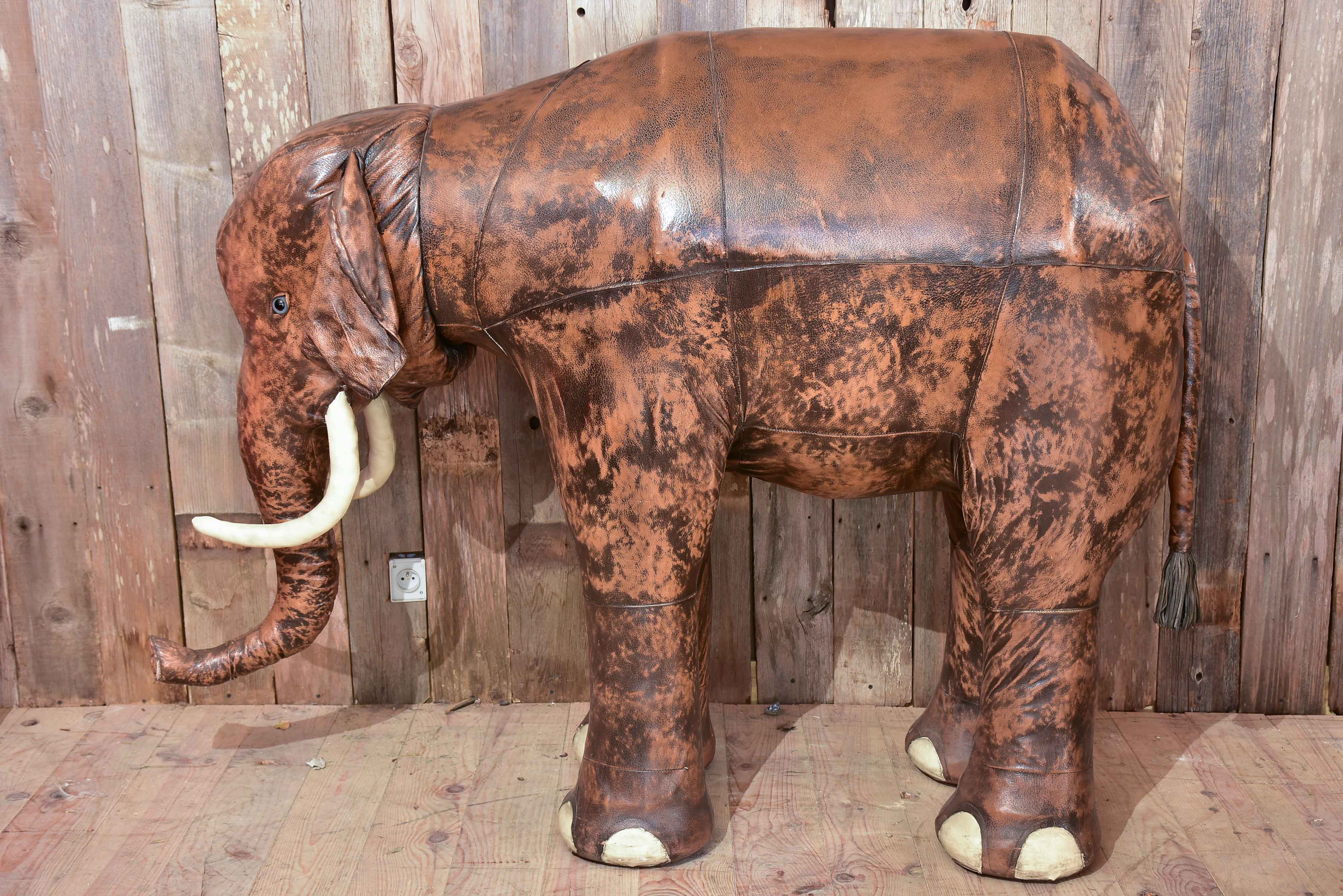 Vintage elephant in leather with hidden bar