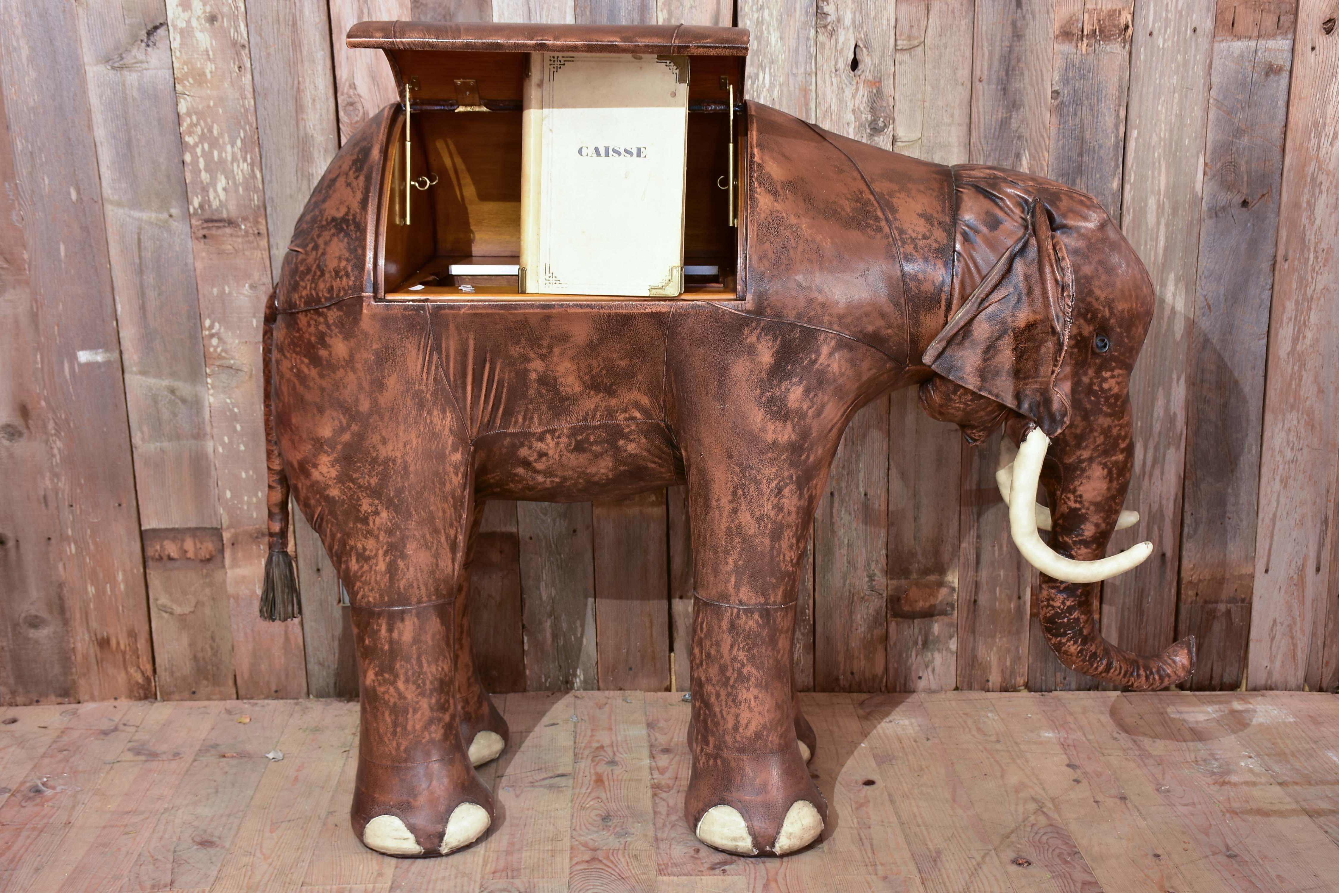 Vintage elephant in leather with hidden bar