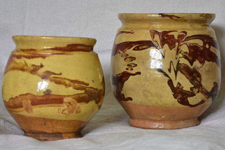 Two clay marbleized honey / preserving pots from Apt 7"