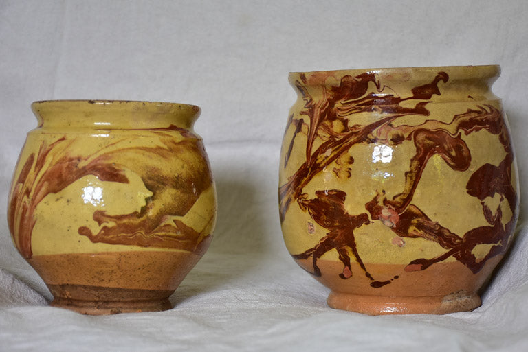 Two clay marbleized honey / preserving pots from Apt 7"