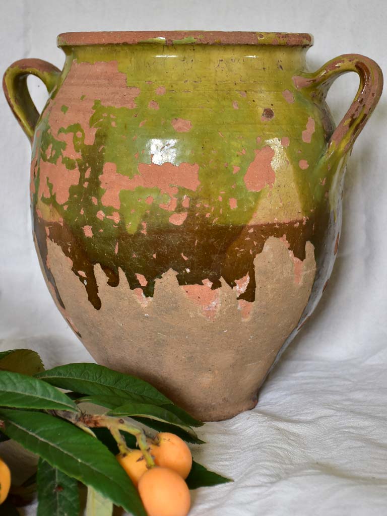 Very large antique French confit pot with fatigued green glaze 13"