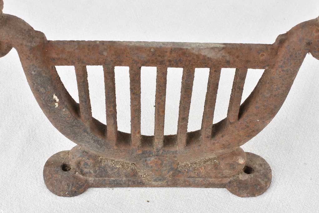 Classic aged iron shoe scraper photo