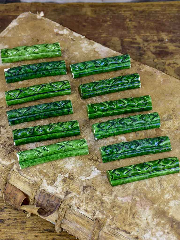 Set of 12 vintage ceramic knife rests with green glaze