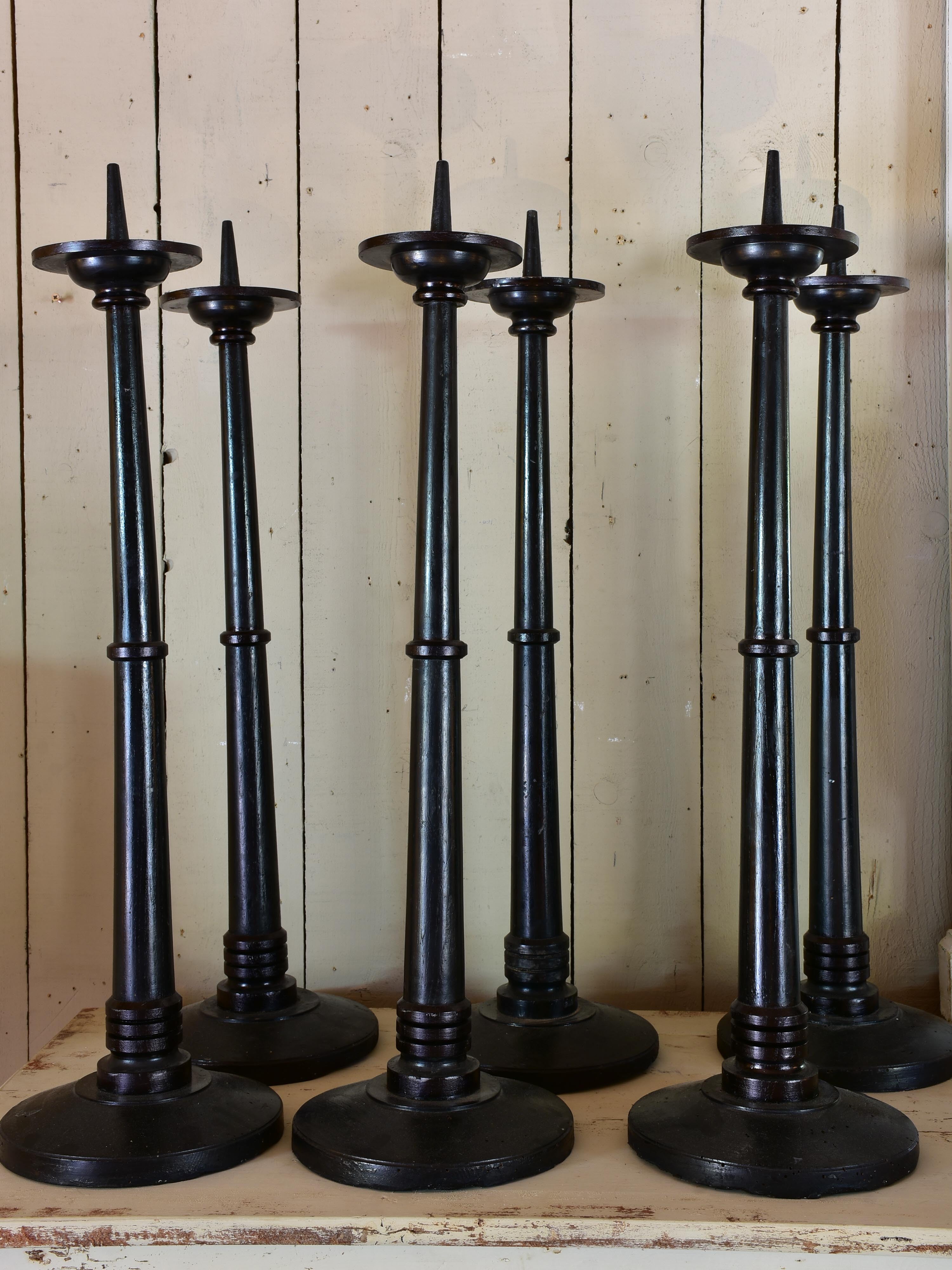 Six extra-large carved French candlesticks