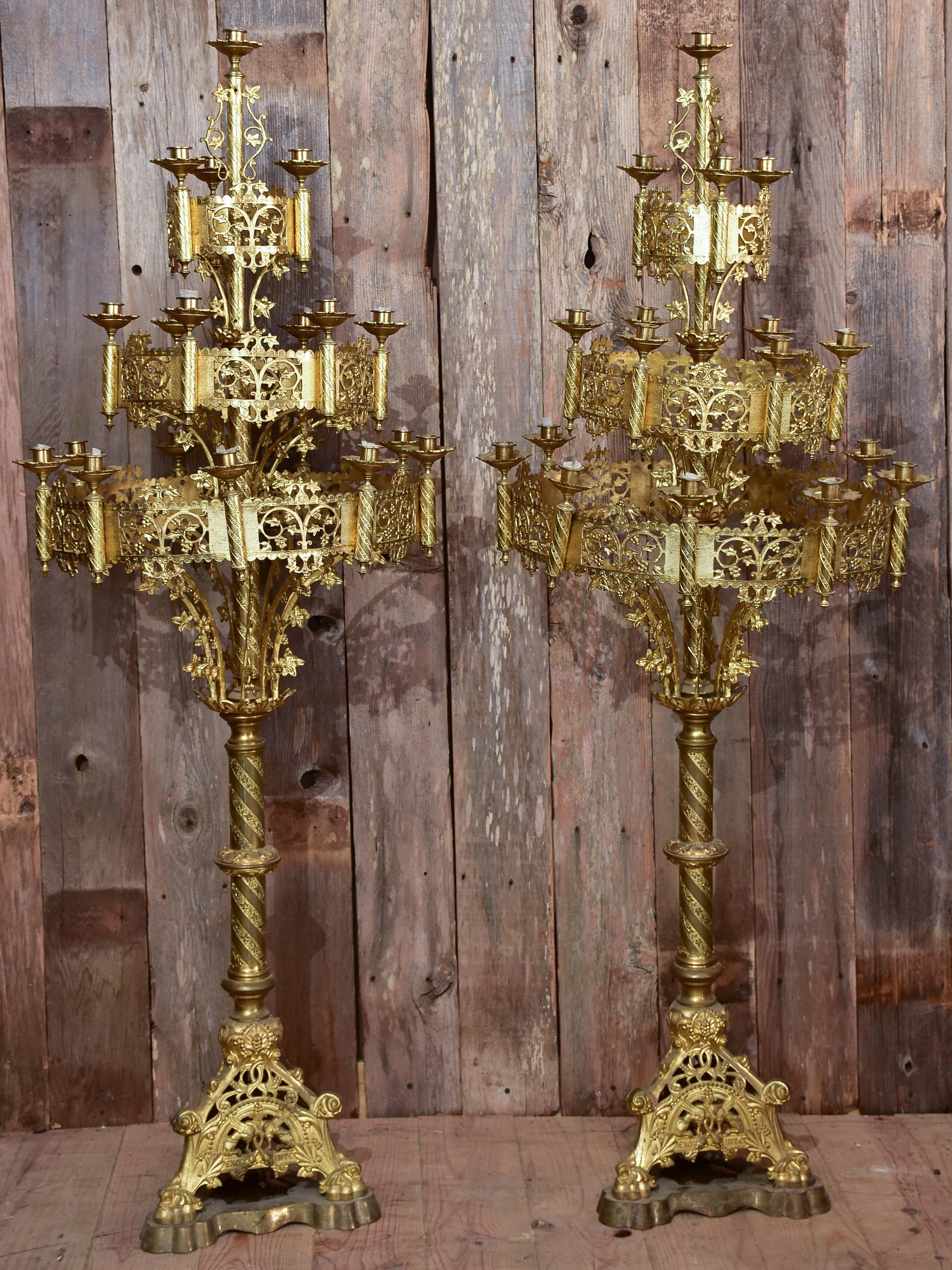 Pair of large gilded church candelabras