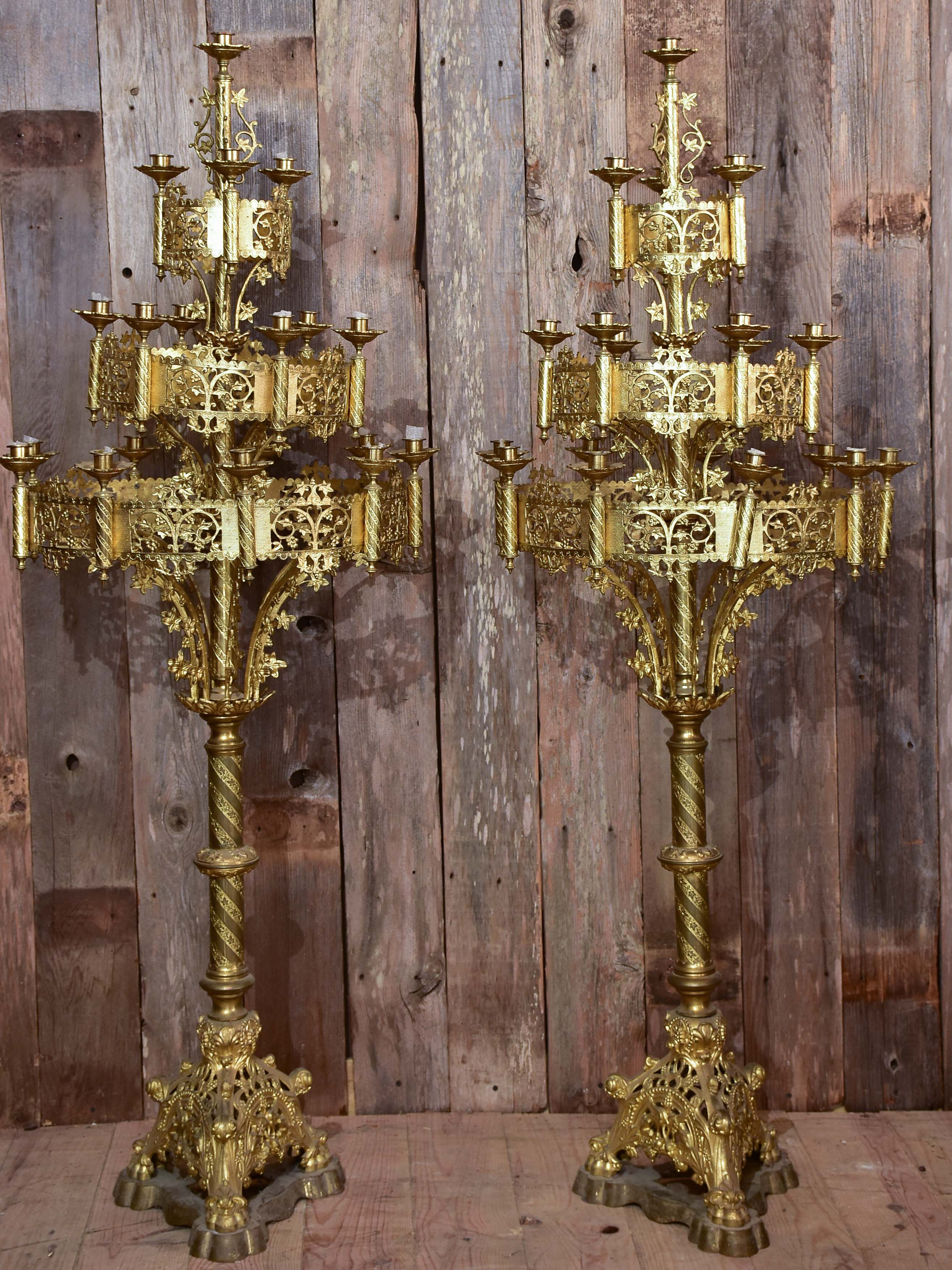 Pair of large gilded church candelabras