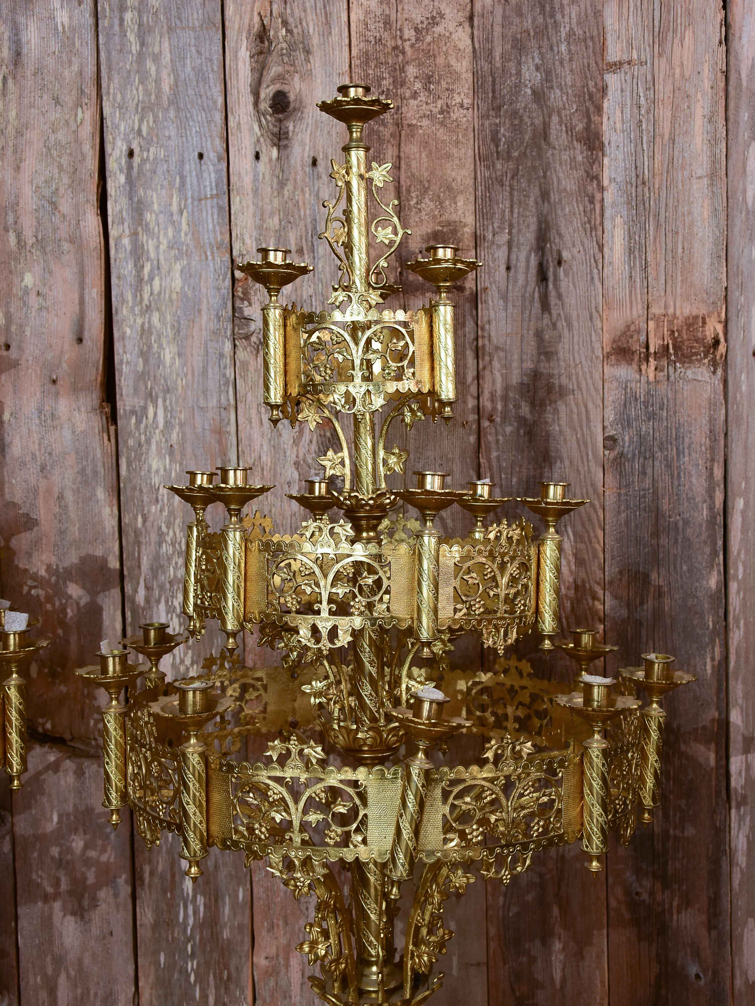 Pair of large gilded church candelabras