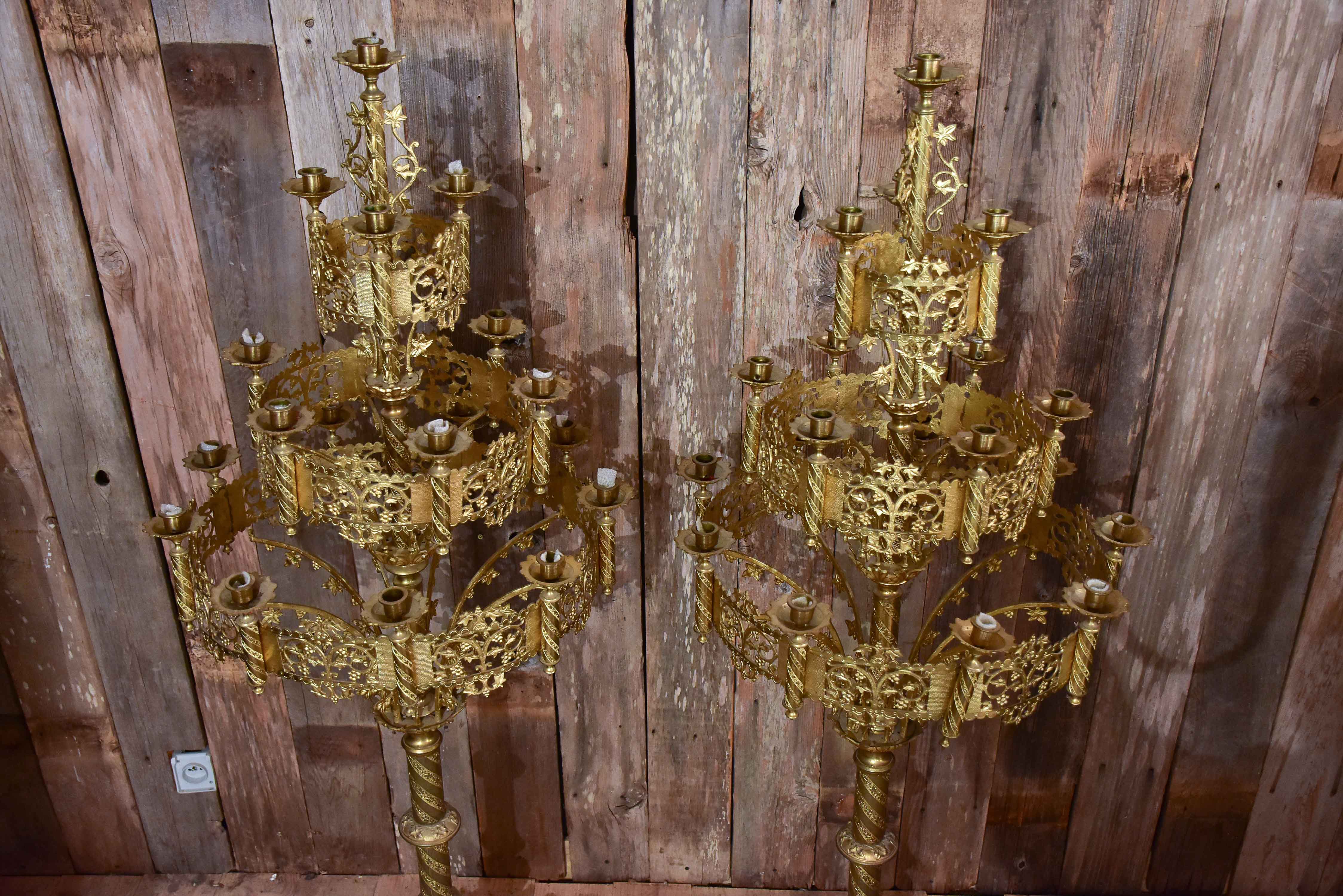 Pair of large gilded church candelabras