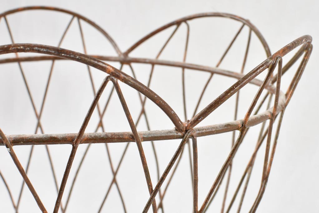 Dented vintage French iron waste bin