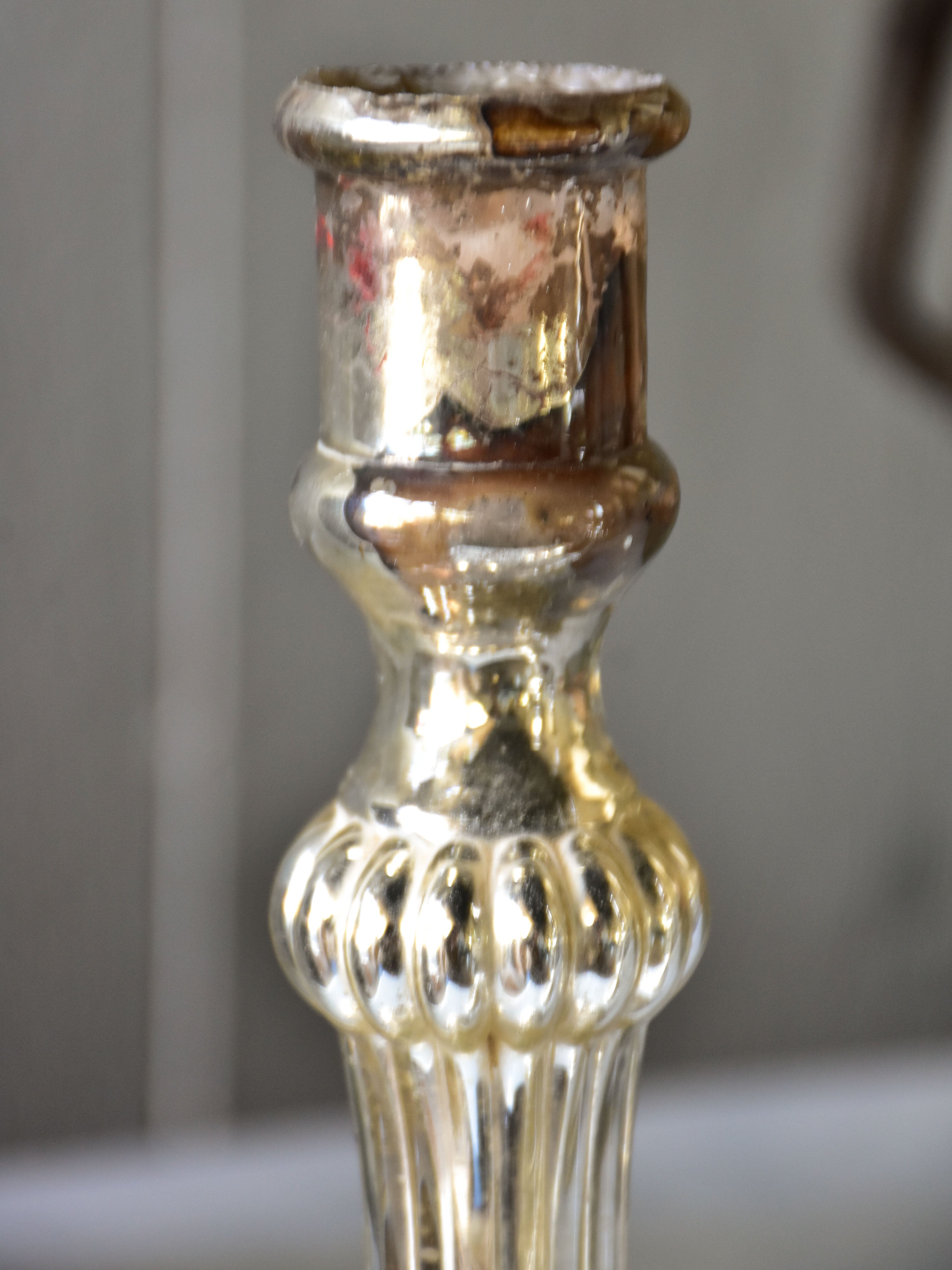 Pair of late 19th century French mercury glass candlesticks