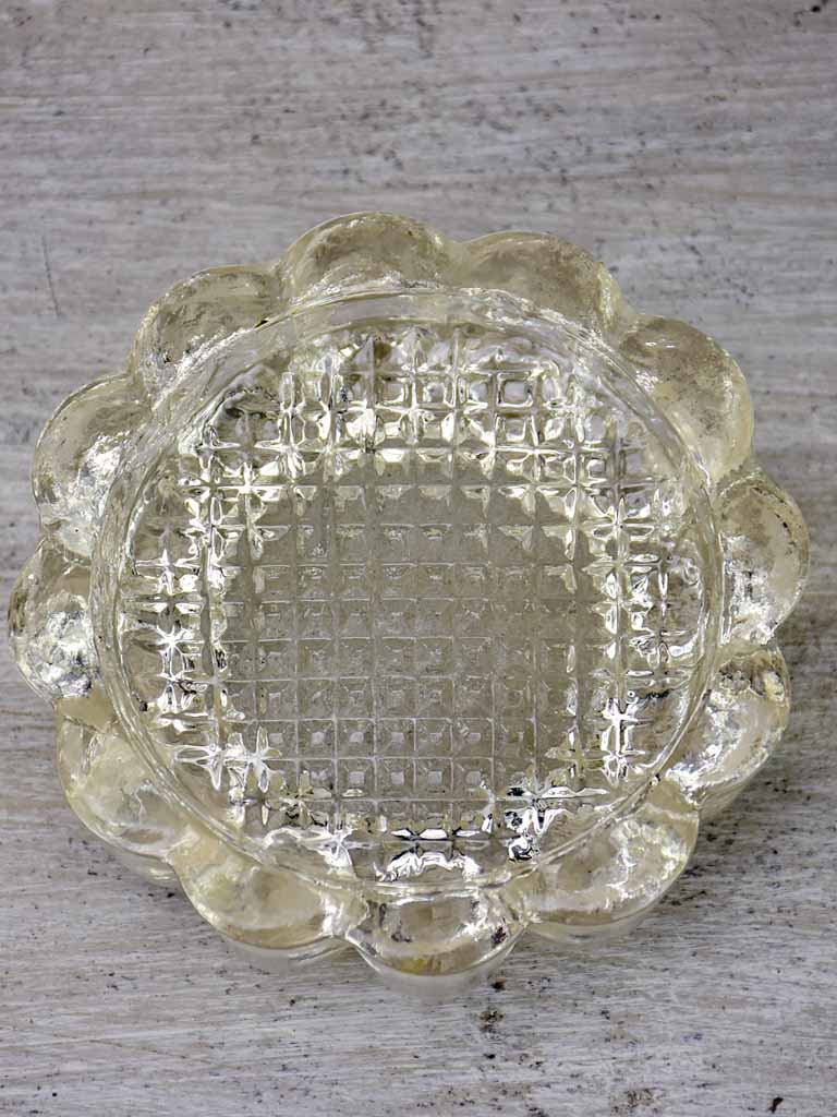 Four antique French glass table risers